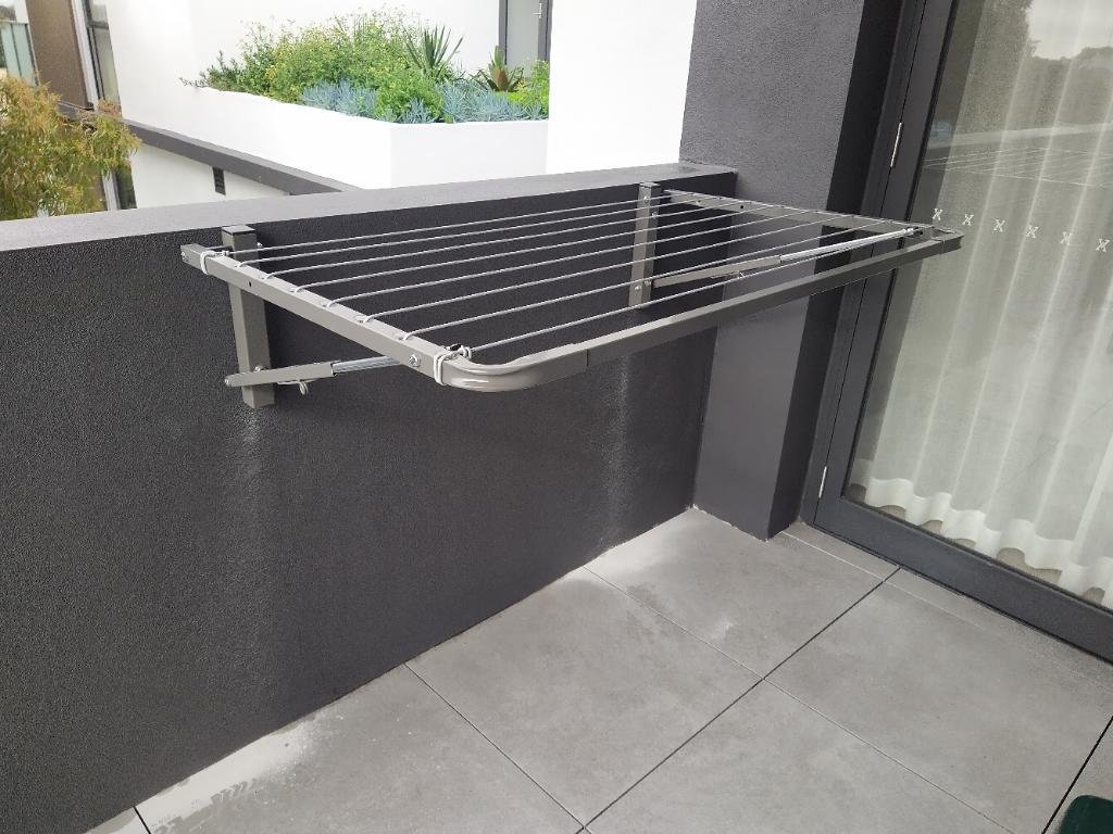 Sky Dry Mini 80 Clothesline — side view showing arm depth and compact footprint