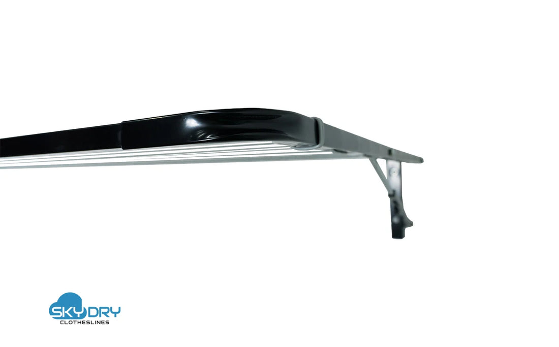 Sky Dry Modern 240 Folding Clothesline — front view installed on masonry wall