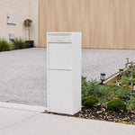 Zip Parcel Letterbox in white installed at a home entrance beside a paved driveway.