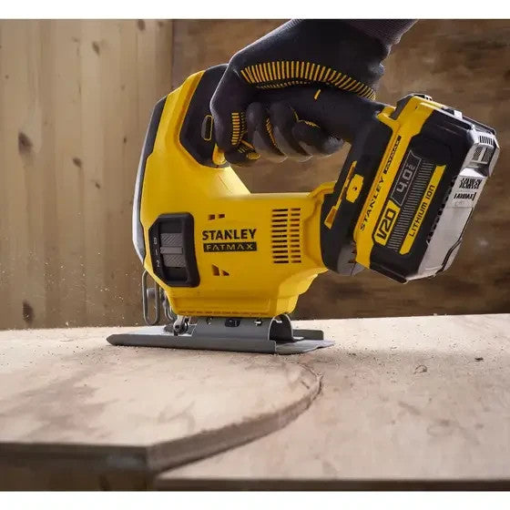 Stanley power tool being used on a wooden surface
