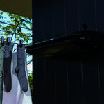 Hills 5 Line Retracting Clothesline — cassette closed showing slim wall-mounted profile